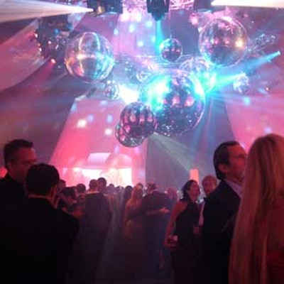 At the Elton John AIDS Foundation’s 13th annual Academy Awards post-party at the Pacific Design Center in Los Angeles, disco balls in various sizes ornamented the round tent’s ceiling, picking up fuchsia lighting from the Lighter Side.