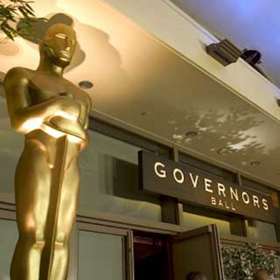 Following the Academy Awards, the prominent players adjourned to the Kodak Theatre ballroom for the annual Governors Ball, where giant Oscar statues flanked the entrance.