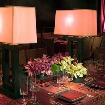 Mark’s Garden provided pink, white, and green orchids for the tables.