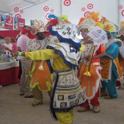 A Junkanoo band made its way through the tasting tents at the South Beach Wine & Food Festival.