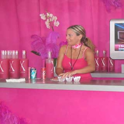 X-Rated Fusion Liqueur stood out from the crowd with a hot pink booth in one of the tasting tents at the South Beach Wine & Food Festival.