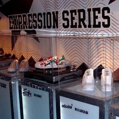 All 35 models of the Superstar shoe were on display inside Plexiglas cases atop white underlit towers. Shoes from the music series were displayed on Scratch DJ Academy's turntables.