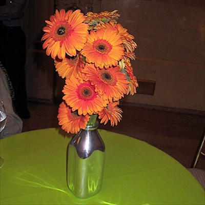 The historic venue Vanderbilt Hall at Grand Central Terminal featured several cows up for auction and tables (from Cipriani 42nd Street) with flowers in silver milk bottles from Ron Wendt Designs.