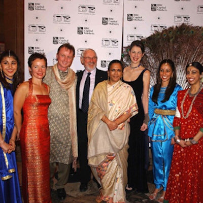 The Canadian Film Centre's gala committee created A Passage to India at the Royal Ontario Museum. Committee members, flanked by dancers from Navrang Academy of Indian Performing Arts, included (from left) Susanne Courtney; Robert Munroe; Norman Jewison, founder of the film centre; filmmaker Deepa Mehta; and Katherine Kossuth.