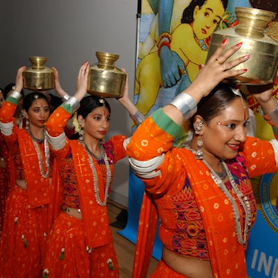 Dancers from the Navrang Academy of Indian Performing Arts prepared for a performance during dinner.