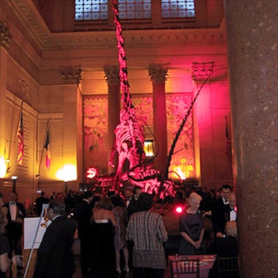 Guests entering the rotunda of the American Museum of Natural History for the Seventh Annual Technology Tango were greeted by dinosaur skeletons illuminated in pink by Bestek Lighting & Staging .