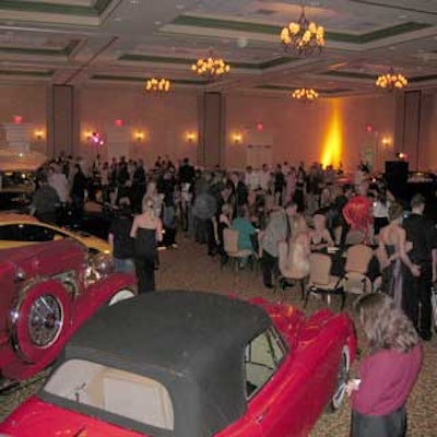 The hotel's ballroom was lined with cars and speedboats for the Festival of Speed gala.