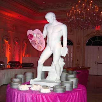 A statue of Michelangelo's David holding an artist's palette graced one of the tables.