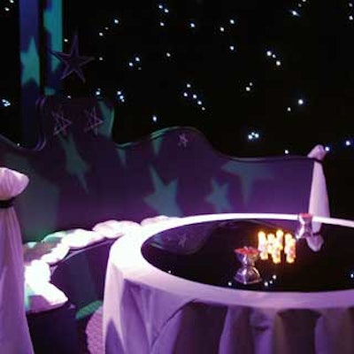 Childlike chalk drawings of stars accented curvilinear booths that hugged mirrored tabletops.