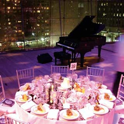 In the dimly lit Allen Room a grand piano sat in front of the massive windowed wall and retro-style lamps lit the tabletops.