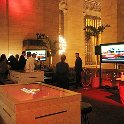 Empire Entertainment custom-built cocktail tables with flat-screen monitors built inside. A clear plexiglass cover protected the monitors, and the casing was made of marble that matched the marble of the railing along Grand Central's balconies and staircases.