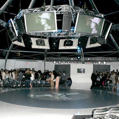 Models strutted on a circular runway.