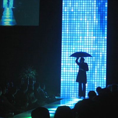 A performance to 'Singin' in the Rain' was one of many during the sexy lingerie show, which showed off the design prowess of theideahop as well as a dynamic stage set from Westbury National Show Systems.