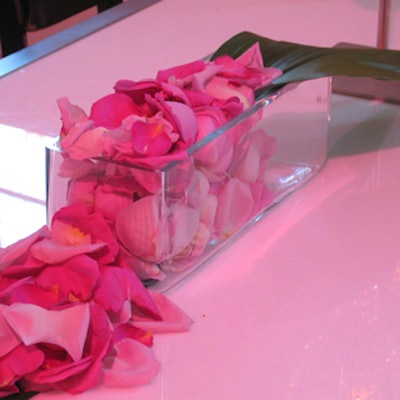 Overflowing rose petals from Church Street Flowers decorated furnishings by Contemporary Furniture Rentals.