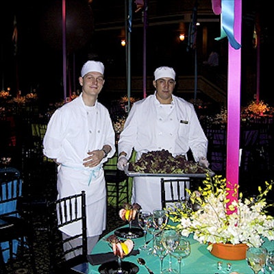 Before the event, servers from Restaurant Associates put food on tables decorated by Renny Designs for Entertaining.