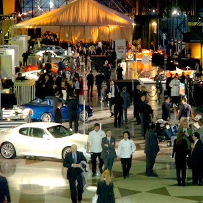 A tent from the Main Event stood at the north end of the Javits Center. Event sponsor Gruppo Ferrari Maserati displayed cars in the cocktail hour space.