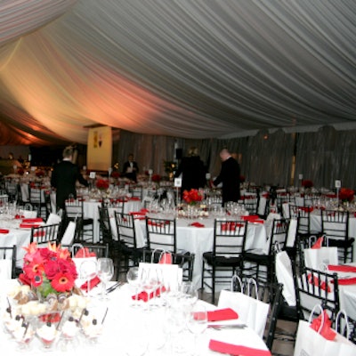 Abigail Kirsch served dinner beneath a tent from the Main Event.