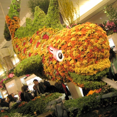 The store's main entry on Broadway was the setting of a giant topiary in the shape of a fish, which was created by the designers at Macy's parade studio. The giant piece spouted water into a koi pond below.