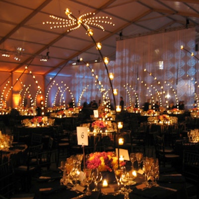 Tall metal candelabra held votives and soared from dinner tables at the Lincoln Center for the Performing Arts’ spring gala at the Tent at Lincoln Center.