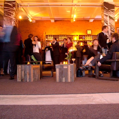 Dark leather chairs clustered around unfinished wooden tables, and lots of 10 Cane bottles adorned the bar.