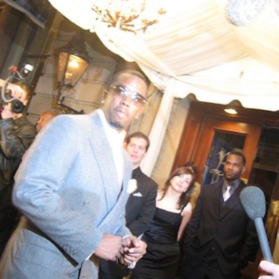 Sean Combs greeted the press at the launch of his Sean John line at the Rosewater Supper Club.