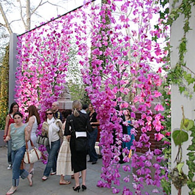 Guests passed through Raul Avila's 16- by 12-foot curtain of hand-strung orchids before entering the cocktail reception area.