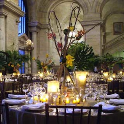 At the New York Public Library’s Young Lions benefit, Grayson Bakula topped the dining tables with burlap-wrapped pillar candles and centerpieces made from towering branches and orchids.