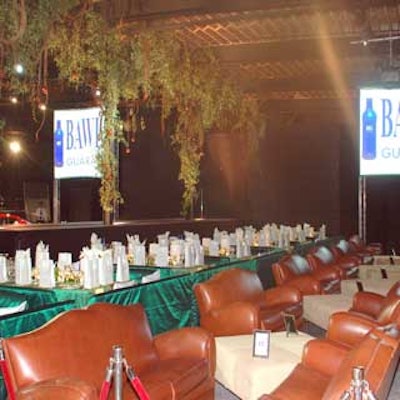 The Jackson Metropolitans' 'Garden of Good and Evil' fund-raiser featured a foliage-accented runway lined with tables dressed in emerald and gold linens, with plush leather seating.