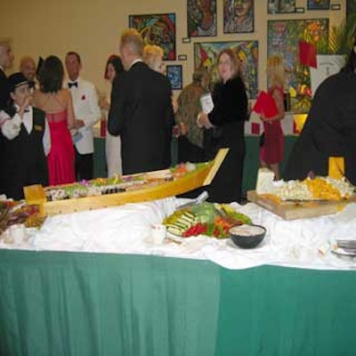 Guests enjoyed appetizers including sushi rolls, roasted vegetables, and cheeses from Parrot Jungle's in-house catering team.