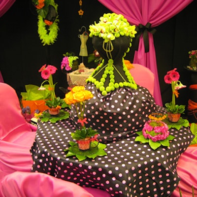 A design by An Affair to Remember embodied a boutique-shopping day in fuchsia, lime green, and black with linens from Around the Table and chair covers from Micki's.
