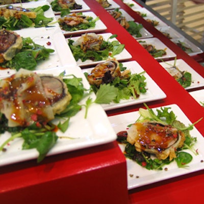 Individual servings of seared tuna appetizers from Marigolds & Onions were set on tiered buffet stations by Nicholas Pinney Design.