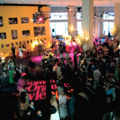The lobby of Jazz at Lincoln Center was lit with pink and orange hues. A gobo of the event’s logo was projected onto the floor.