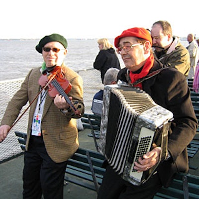 The array of entertainment at the closing night party on Ellis Island started on the ferry ride.