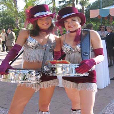 Entertainers dressed as cigar girls passed out cigars to NACE members and guests.