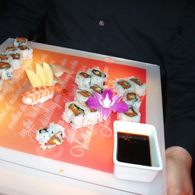 The Japanese restaurant served abundant sushi on Absolut-branded light-up trays.