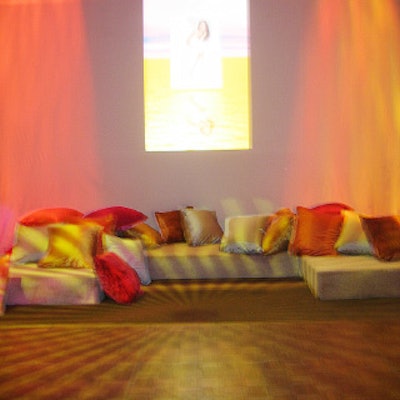 Lounge areas consisted of low cushions dotted with colorful pillows.