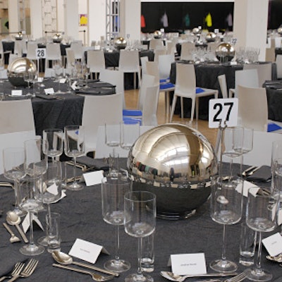 At the Dia Art Foundation's spring benefit at Dia: Beacon, designer Annalisa Milella decorated the tabletops with crinkly gray cotton fabric and reflective gazing globes as centerpieces, which were an homage to Andy Warhol and his frequent use of shiny materials.