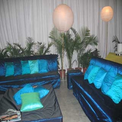 The sponsor lounge featured cool blue sofa groupings with plenty of pillows.