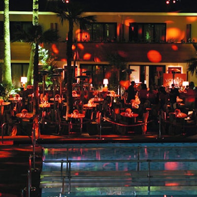 A 31-foot plexiglass bridge carried guests across the pool, which also broadcast the Entourage logo.