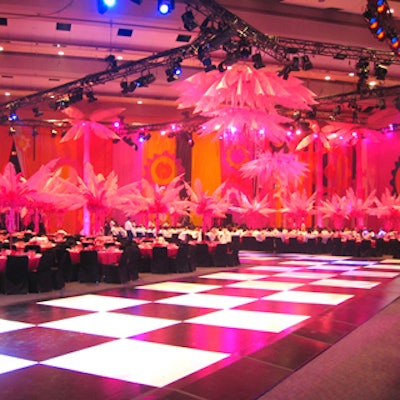A black-and-white dance floor zigzagged through the event space at the 39th annual Brazilian Carnival Ball at the Metro Toronto Convention Centre.