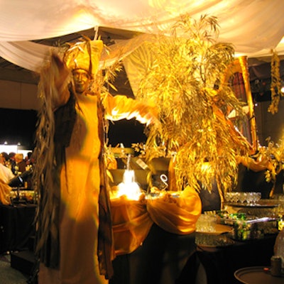 An actor in a tree costume provided live swaying decor.