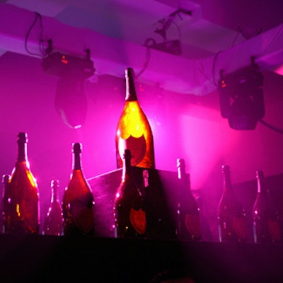 When it came time to reveal the brand’s new bottle, a Dom magnum rose up from the center of a bar area amid multicolored spotlights.