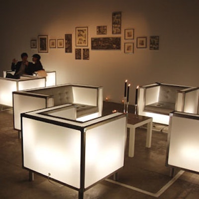 One of the lounge areas featured light-up seating in silver and white.