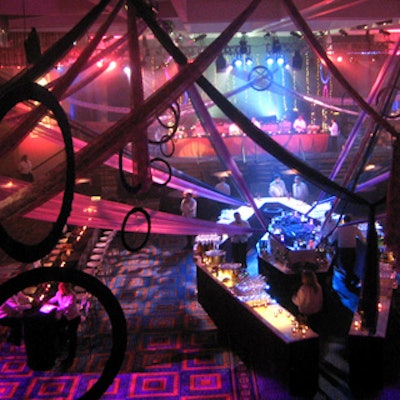 A curtain of water cascaded into a bed of hydrangeas behind a bar near the back of the ballroom