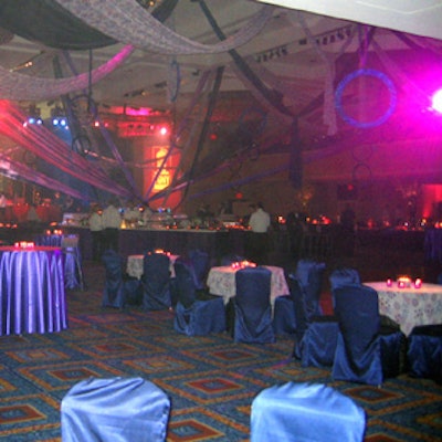 Blue satin-covered tables and chairs filled the ballroom.