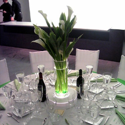 White calla lilies were used to further the white and green look; illuminated bases made the green stalks appear bright green, similar to the lime accents.