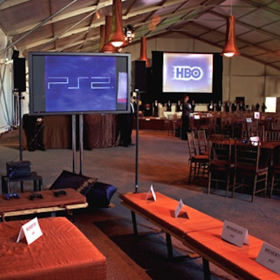 Guests played PlayStation games on plasma TVs.