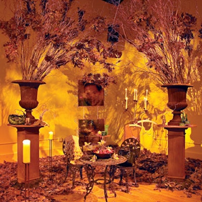 A flowerpot filled with moss, branches, and covered with flower petals displayed makeup and accessories.