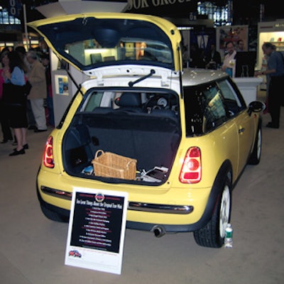 The trunk of a Mini Cooper was open for Book Expo America attendees to help themselves to free miniature books and kits from Perseus Books Group’s Running Press.