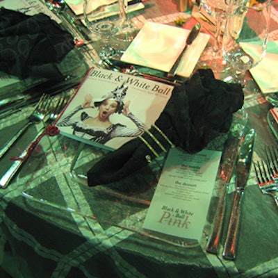 Square glass charger plates from Chair-man Mills accented the variety of linens from Around the Table.